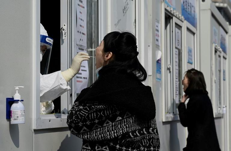 Covid-19: la Chine confine une ville de 9 millions d’habitants